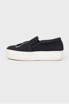 Textile slip-ons with chunky soles
