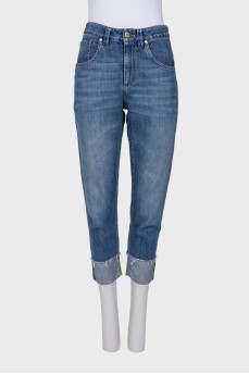 Blue jeans with embellished hem