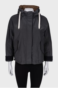 Gray hooded windbreaker