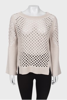 Wool sweater with perforations
