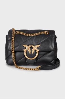 Quilted bag with gold hardware