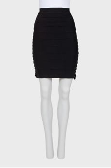 Black skirt decorated on the sides