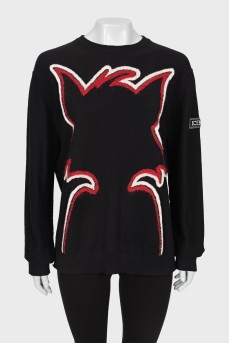 Black sweater with seams facing out