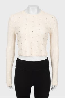 Cashmere sweater decorated with rhinestones