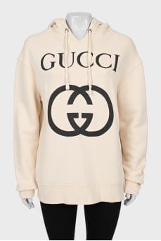 Beige hoodie with brand logo