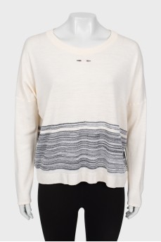 Wool sweater with brooch