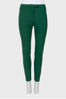 Green tapered trousers