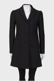 Coat decorated with bows