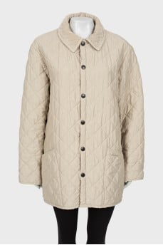 Quilted coat with press-studs closure 