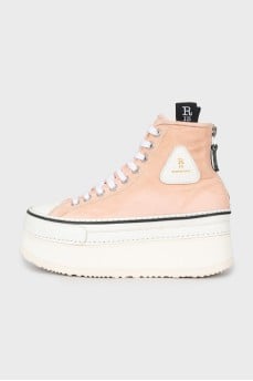 Pink high-heeled sneakers