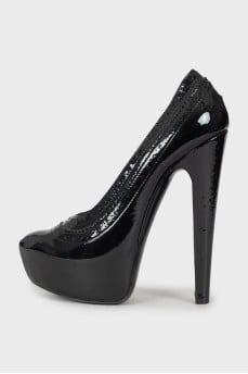 Patent leather shoes with perforations