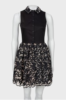 Black dress with a patterned hem