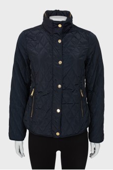 Navy blue jacket with gold hardware
