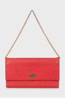 Red leather clutch
