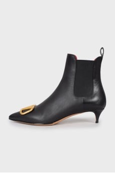 Leather ankle boots with gold logo