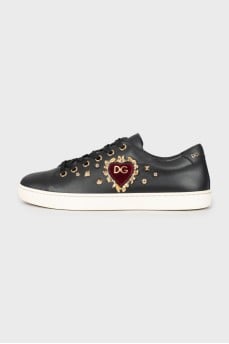 Black leather sneakers with decor