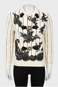 Decorated striped sweater