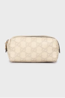 Leather cosmetic bag with branded embossing