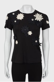 Black T-shirt decorated with flowers