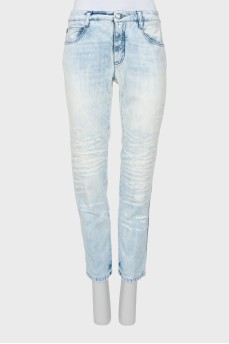 Light blue jeans decorated with sequins