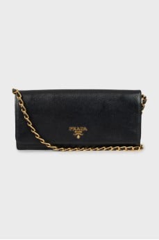 Leather clutch with brand logo