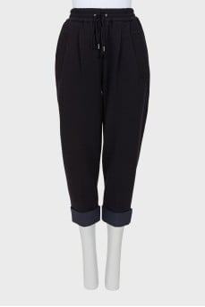 Knitted trousers with elastic