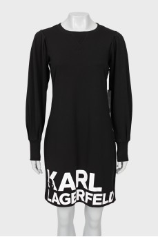Dress with logo on hem with tag
