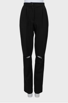 Straight trousers with slits at the knees