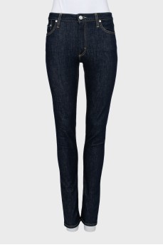 Mid-rise dark blue jeans