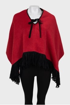 Wool poncho with fringes
