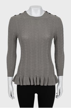 Knitted jumper with ruffled bottom
