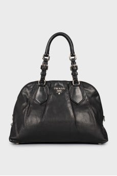 Leather bag with silver logo