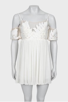 Mini dress with pleated hem