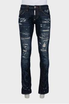 Men's blue jeans with distressed effect