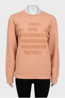 Orange sweatshirt with brand logo