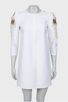 Mini dress with decorative shoulders