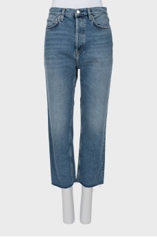 Button-down jeans with raw hem
