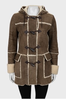 Sheepskin coat for brakes with hood