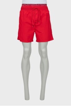 Men's red shorts with tag