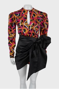 Silk dress decorated with a bow
