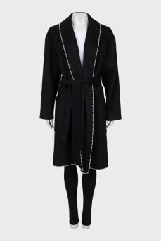 Black coat decorated with beads