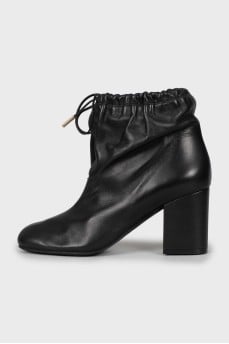 Leather ankle boots with tags