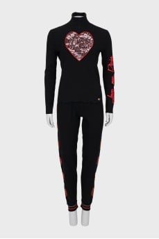 Knitted suit decorated with rhinestones
