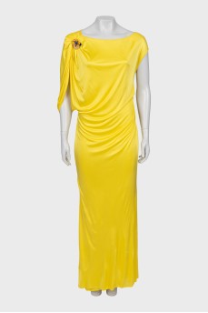 Yellow dress with brooch