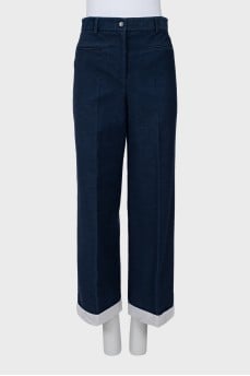 Denim trousers with rolls