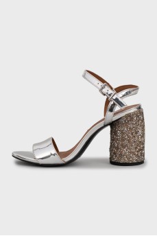 Silver sandals with decorative heels