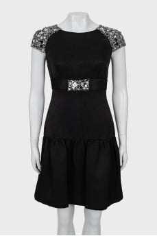 Black dress decorated with rhinestones