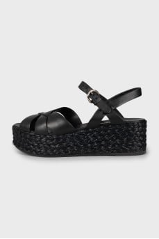Leather sandals with woven soles