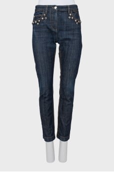 Dark blue jeans with metallic detailing