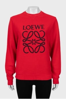 Red sweatshirt with embroidered logo